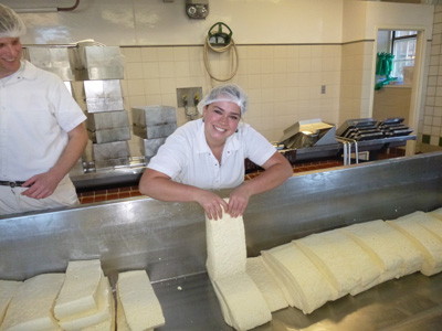 Lucy, from our Cheese Department, at Shelburne Farms making Cheddar magic happen!
